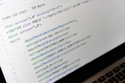 Detailed view of XML coding on a computer screen, showcasing software development.